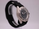 Another angled side view of the Police watch, highlighting the case shape and the marked rotating bezel.