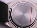 Detailed close-up of the polished stainless steel case back, with engravings 'WATER RESISTANT 30M JAPAN MOVT STAINLESS STEEL BACK'.