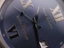 Extreme close-up of the Gianni Sabatini blue dial with applied Roman numerals and text detail.
