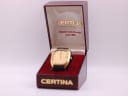 The Certina Newport watch nestled in its open original dark red Certina presentation box.