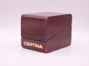 Closed view of the original dark red Certina presentation box with Certina logo.