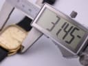 Digital caliper measuring the Certina Newport case diameter at 31.45mm.