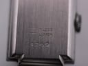 Detailed close-up of the watch's case back, clearly showing the engraved text 'Stainless Steel Back' and the serial number '4269'.