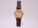 Seiko 2Y01-0A10 watch with gold dial and gold case, circa 1991