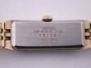 Clear close-up of the watch case back, showing 'SEIKO SGP BACK ST. STEEL' engraving and model/serial numbers.