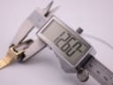 Digital caliper measuring the case width of the Seiko watch at precisely 12.60mm.