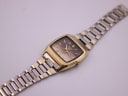 Top-down view of the vintage Seiko watch with its two-tone steel bracelet laid flat, showcasing the full length.