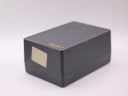 Closed view of the original black Seiko watch box with gold lettering.