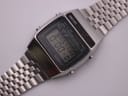 Close-up angled view of the Seiko A159-5009-G dial, showing the digital display at 0:00:00, with text 'QUARTZ LC' and various mode indicators.