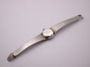 Underside view of the Jesty watch, revealing the smooth back of the bracelet and case.