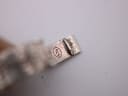 Close-up of the bracelet clasp, clearly showing the '925' sterling silver hallmark.