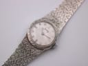 Close-up, top-down view of the Jesty watch dial and textured sterling silver bracelet.