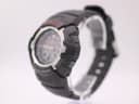 Angled side view of the G-Shock GW-1500A showing the right side of the black resin case with 'light' and 'search' buttons.