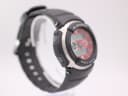 Left-side angled view of Casio G-Shock G-300 watch, showing the black resin case, stainless steel bezel, and control buttons.