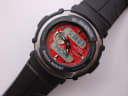 Close-up angled view of the red ana-digi dial of the Casio G-Shock G-300, showing current time and sub-dial.