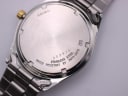 Detailed close-up of the stainless steel case back of the Seiko watch, showing model number 7N43-9070 and "Water Resistant" engraving.