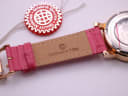 Close-up of the inner side of the pink leather strap, clearly showing the 'Constantin Weisz' brand stamping and the texture of the genuine leather.
