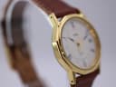 Other side view of the gold-tone Timex watch, highlighting the octagonal case.