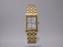 Front view of gold Raymond Weil Tango watch with cream mother-of-pearl dial and rectangular case.