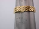 Watch bracelet on a wrist sizing gauge, showing a measurement aligning with approximately 160mm circumference.
