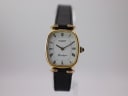 Tissot watch with white dial and gold case, circa 1970s