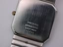 Close-up of the brushed stainless steel case back with "STAINLESS STEEL WATERRESISTANT SWISS MADE 15436" engraving.