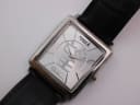 Close-up of the silver dial featuring the 'Hope' character and 'Whatever It Takes.org' logo.
