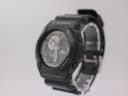 Three-quarter view of black G-SHOCK GA-300 watch from the right, showing side buttons and robust resin case.