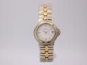 Front view of the Bulova two-tone quartz watch with a white dial and gold-tone baton indices.