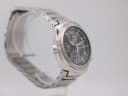 Another side-angle view of the Seiko watch, focusing on the left profile and integrated bracelet design.
