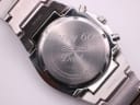 Close-up of the stainless steel case back with "Happy 60th Seiko Dad" engraving and model/serial number details.