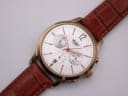 Top-down view of the Henry London Pimlico watch, displaying the white chronograph dial and crocodile-grain brown leather strap.