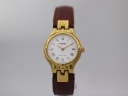 Tissot watch with white dial and gold case, 1990s