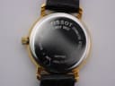 Close-up of the stainless steel case back of the Tissot T825/925, showing "TISSOT", "SAPPHIRE CRYSTAL", "STAINLESS STEEL", "30M WATERRESISTANT" and model number.