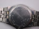 Close-up of the Seiko SQ 100 case back displaying model numbers, serial number, and '10BAR WATER RESISTANT' engraving.