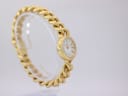 Three-quarter view of the Verity watch highlighting the gold-tone finish and the integrated chain link bracelet design.