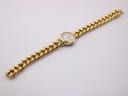 Top-down view of the entire Verity watch, displaying the gold-tone chain link bracelet extended flat.