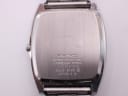 Case back of the Seiko watch, engraved with "WATER RESISTANT STAINLESS STEEL" and model/serial numbers 3223-5130.