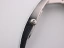 Close-up of the Gucci 3900 L crown, clearly showing the embossed 'G' logo.