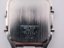 Close-up of the brushed stainless steel case back with "CITIZEN WATCH CO. WATER RESIST STAINLESS C480-314743 K 990299 GN-4-S JAPAN" engravings.