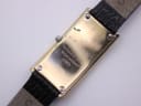 Close-up of the watch case back, showing "MAURICE LACROIX SWISS MADE Goldplated G10 Waterresistant AG53831" engravings.