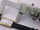 Digital caliper measuring the watch case length (lug-to-lug) at 44.29mm.