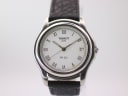 Front view of Tissot PR 50 watch with white Roman numeral dial and date window.