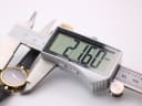 Digital caliper measuring the Gucci 2000L watch case diameter precisely at 21.60mm, confirming its small size.