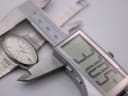 Digital caliper measuring the horizontal case diameter of the Mortima watch at 27.35mm.