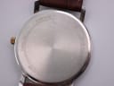 Slightly different angle of the stainless steel case back, clearly showing 'Bulova', 'Stainless Steel', and model/serial numbers.