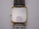 Close-up of the stainless steel case back of the Seiko watch, showing model number 6530-5760 and serial number 559528.