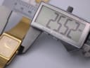 Digital caliper display showing the exact case size of the Seiko watch as 25.52 mm.