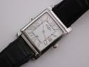 Overhead close-up of Rotary Revelation watch white dial with Roman numeral indices and date window.