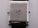 Close-up of the Rotary Revelation case back showing "ROTARY REVELATION SAPPHIRE SWISS MADE" and serial number.